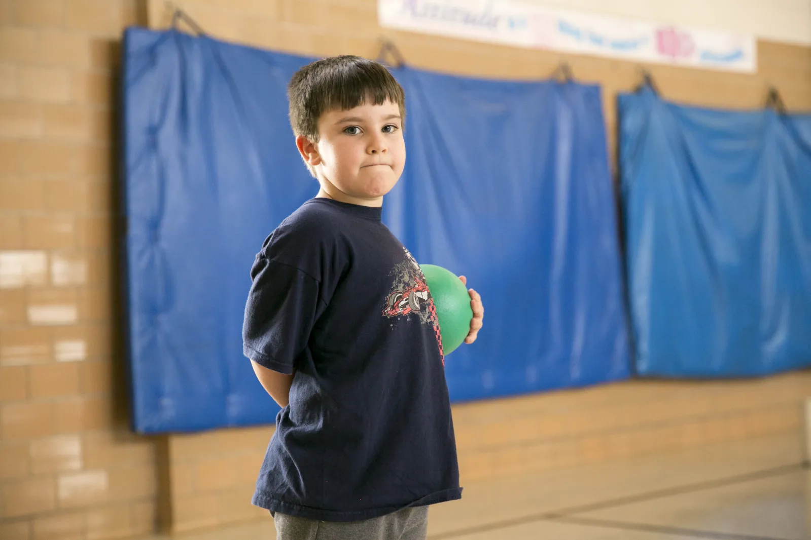 boy with green ball