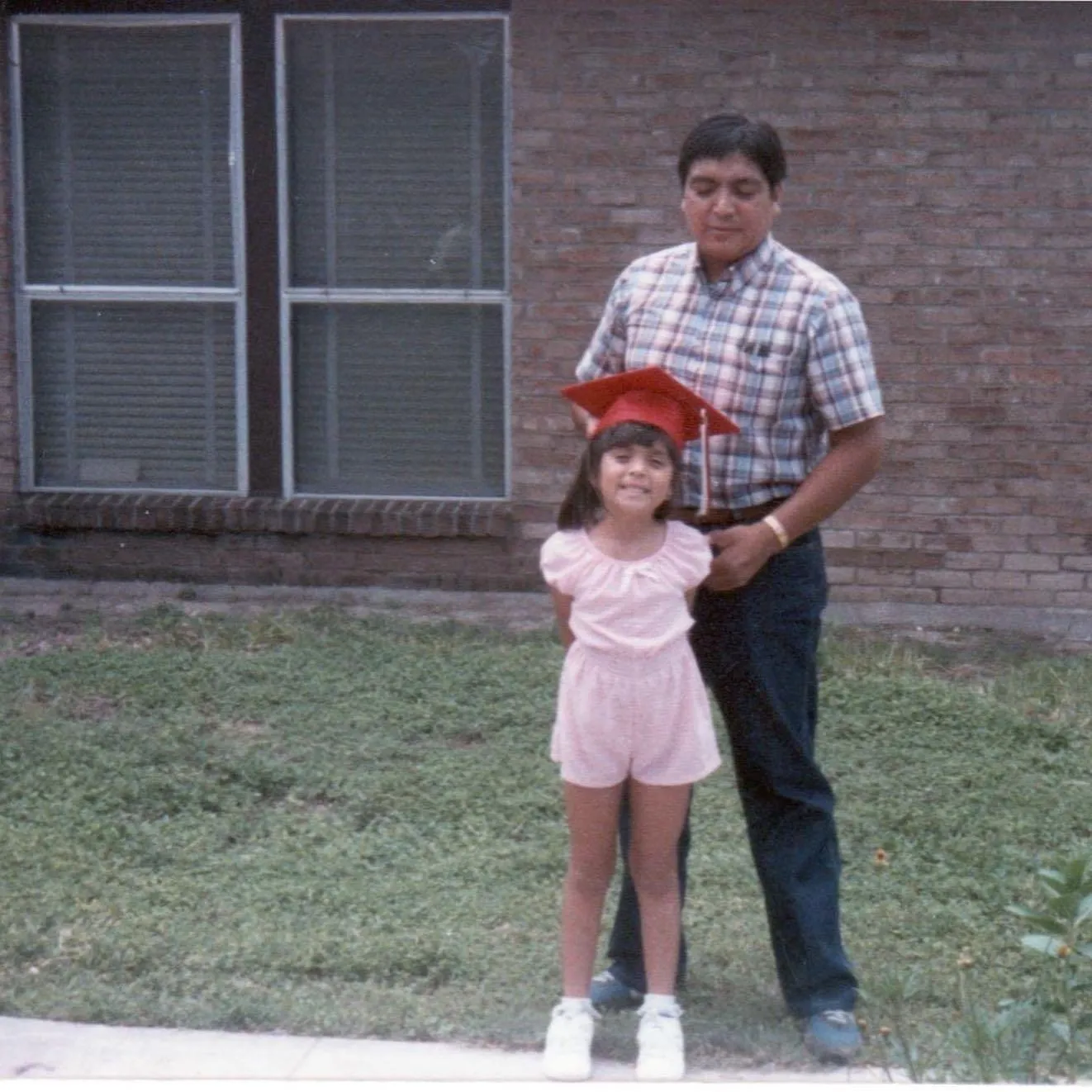 Old photo of girl and dad