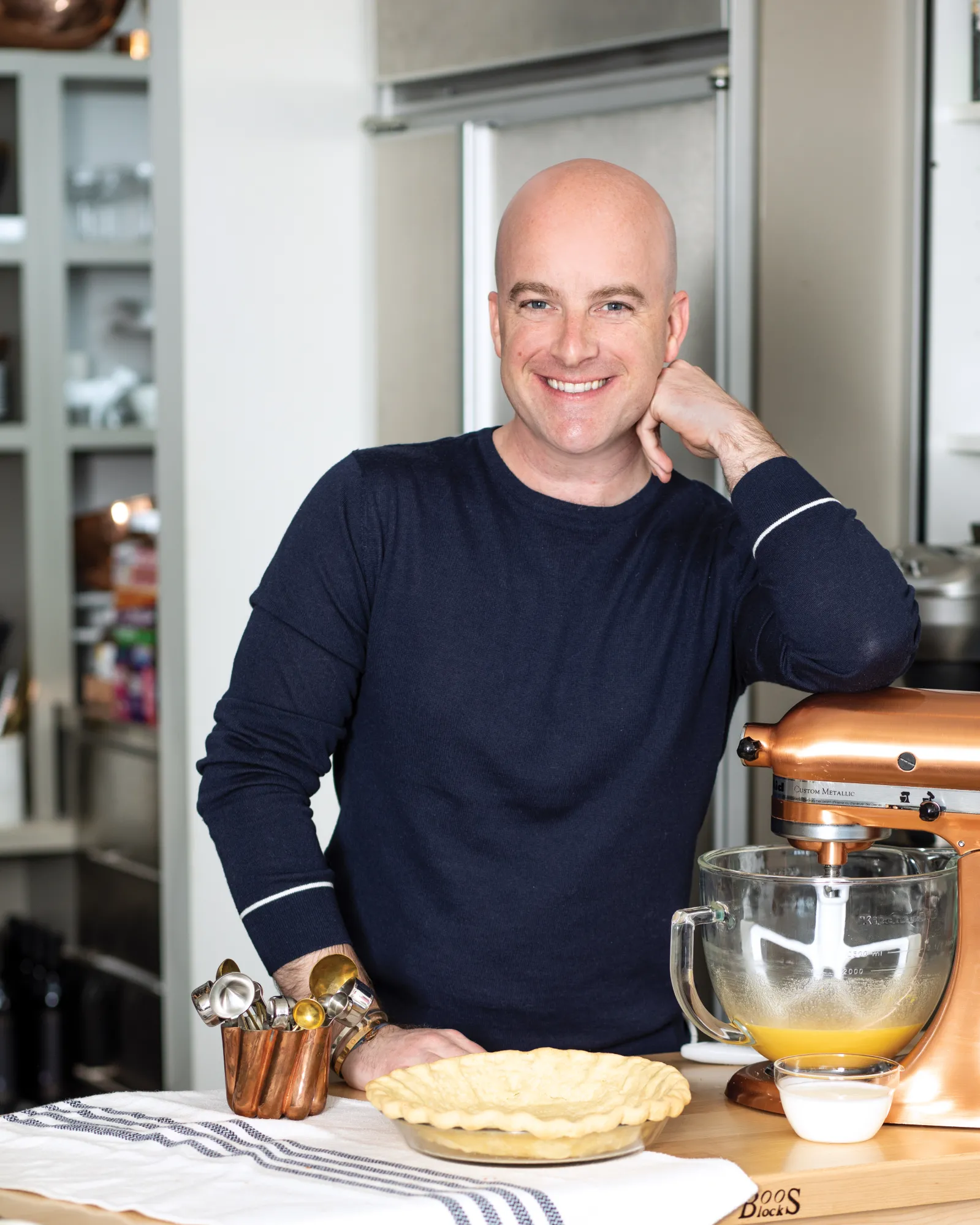 Man in kitchen with baking equipment