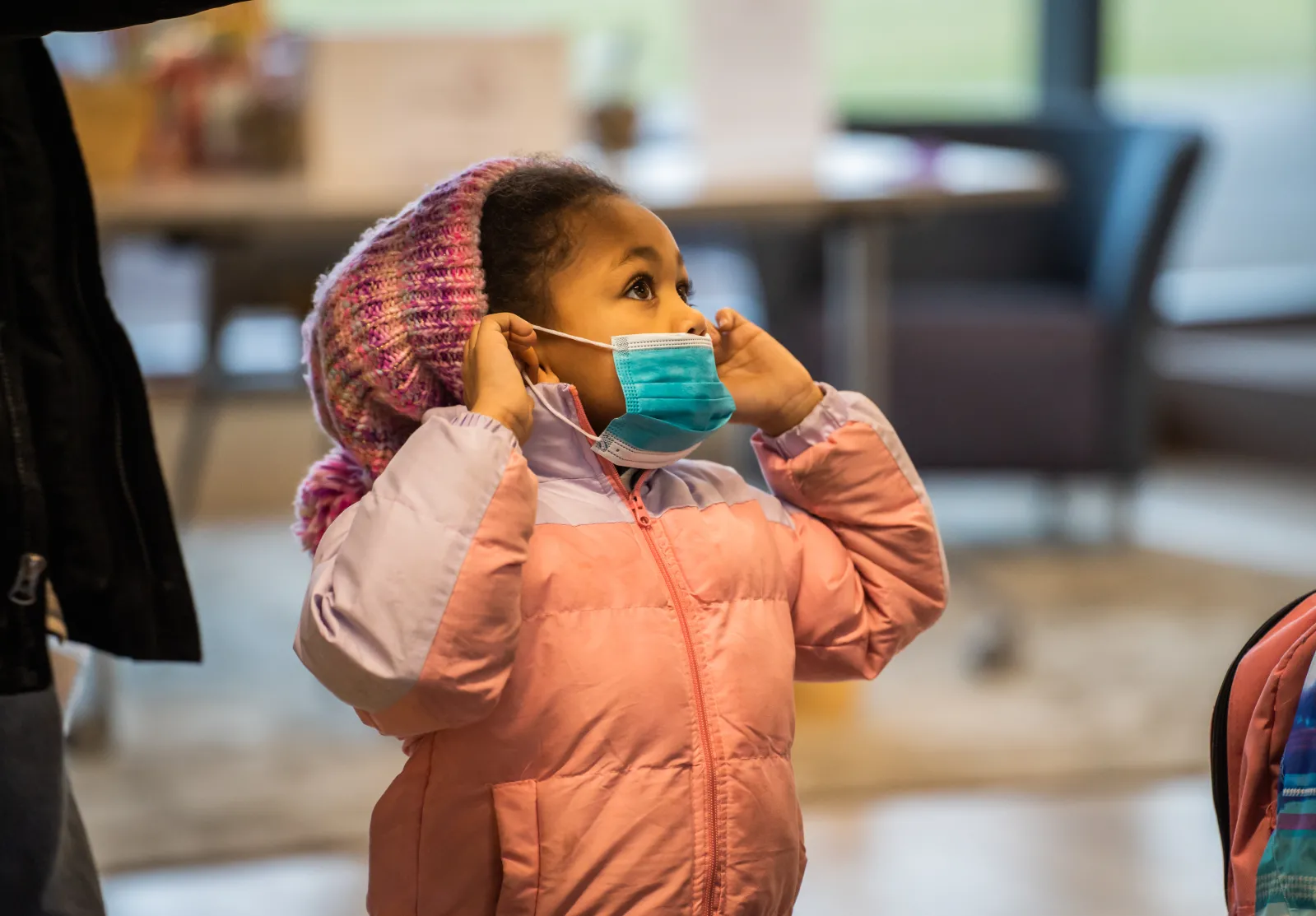 little girl with oversized mask 2