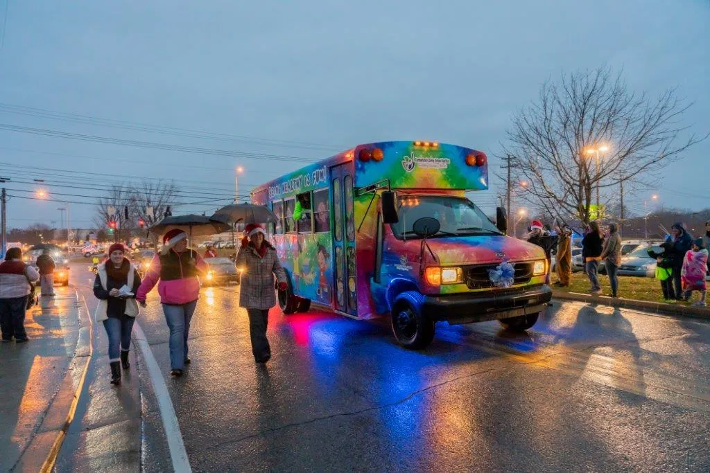 Bus with colorful lights at Christmas parade