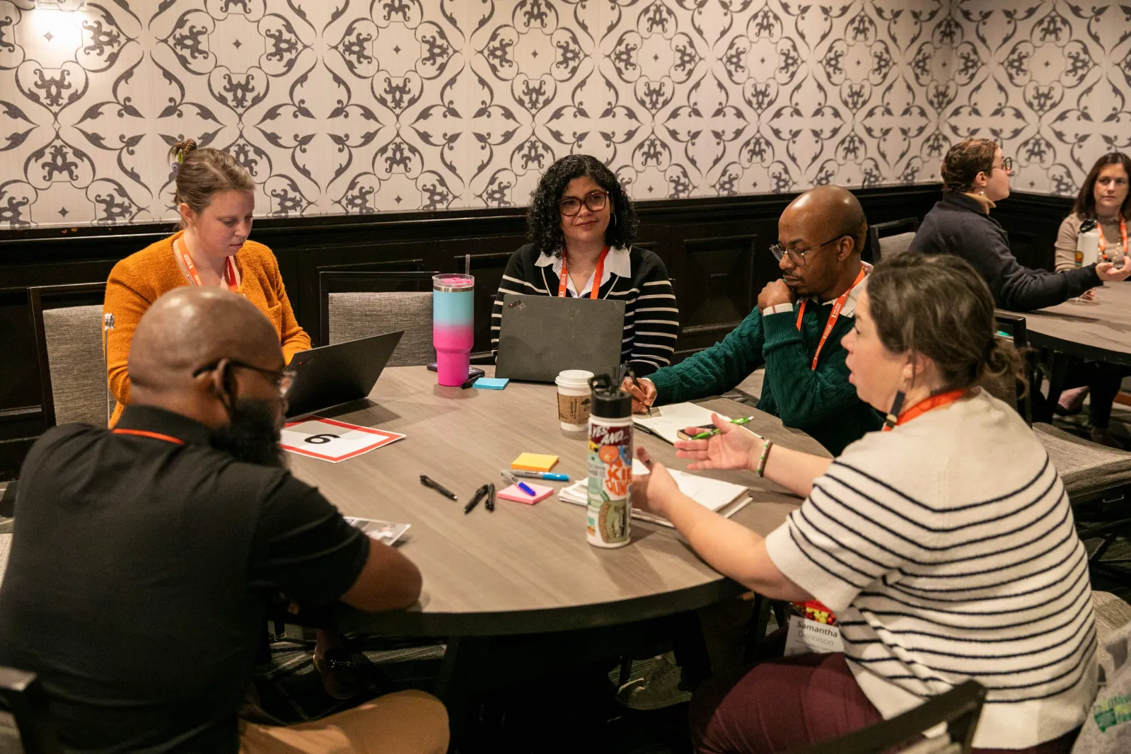 People talking around a table