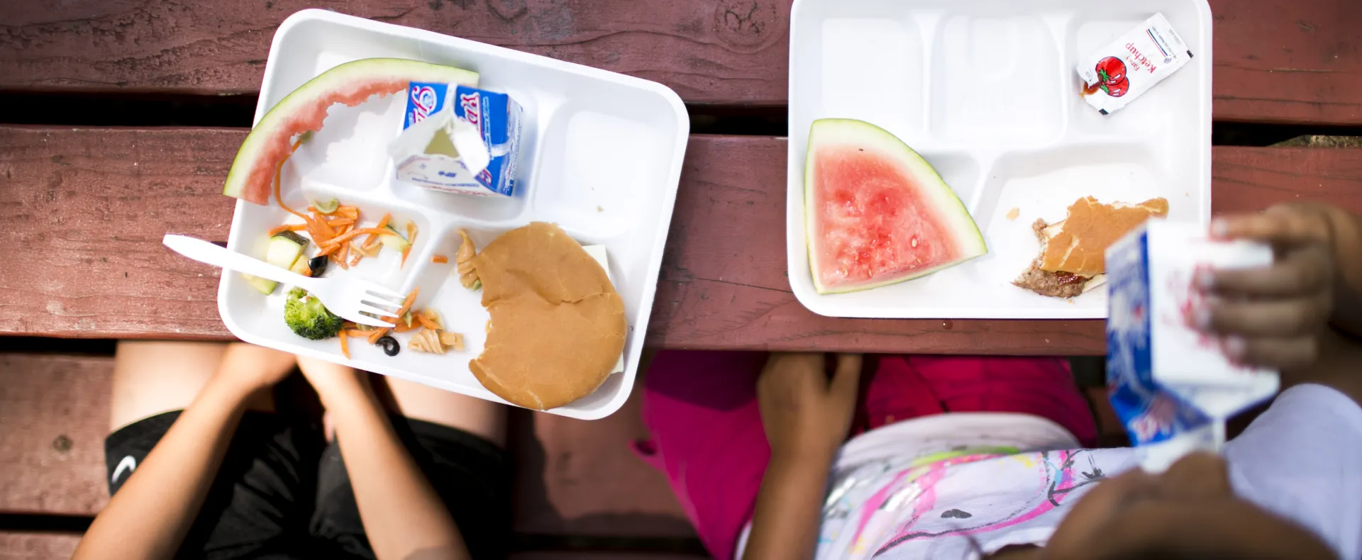 Summer meals on outdoor picnic table