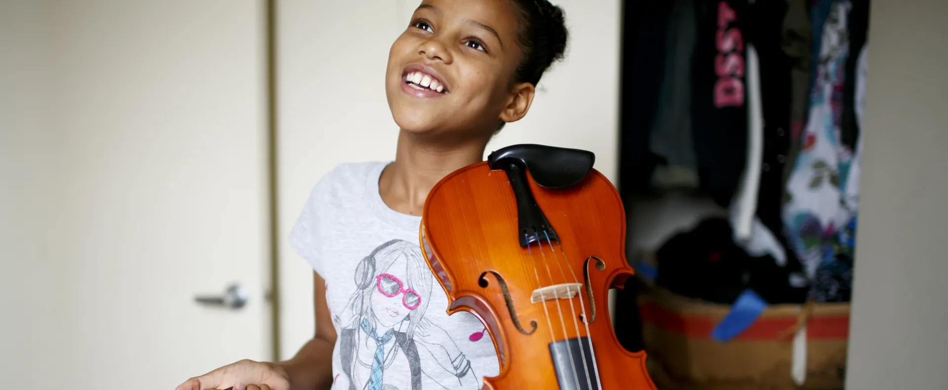 Girl holding violin