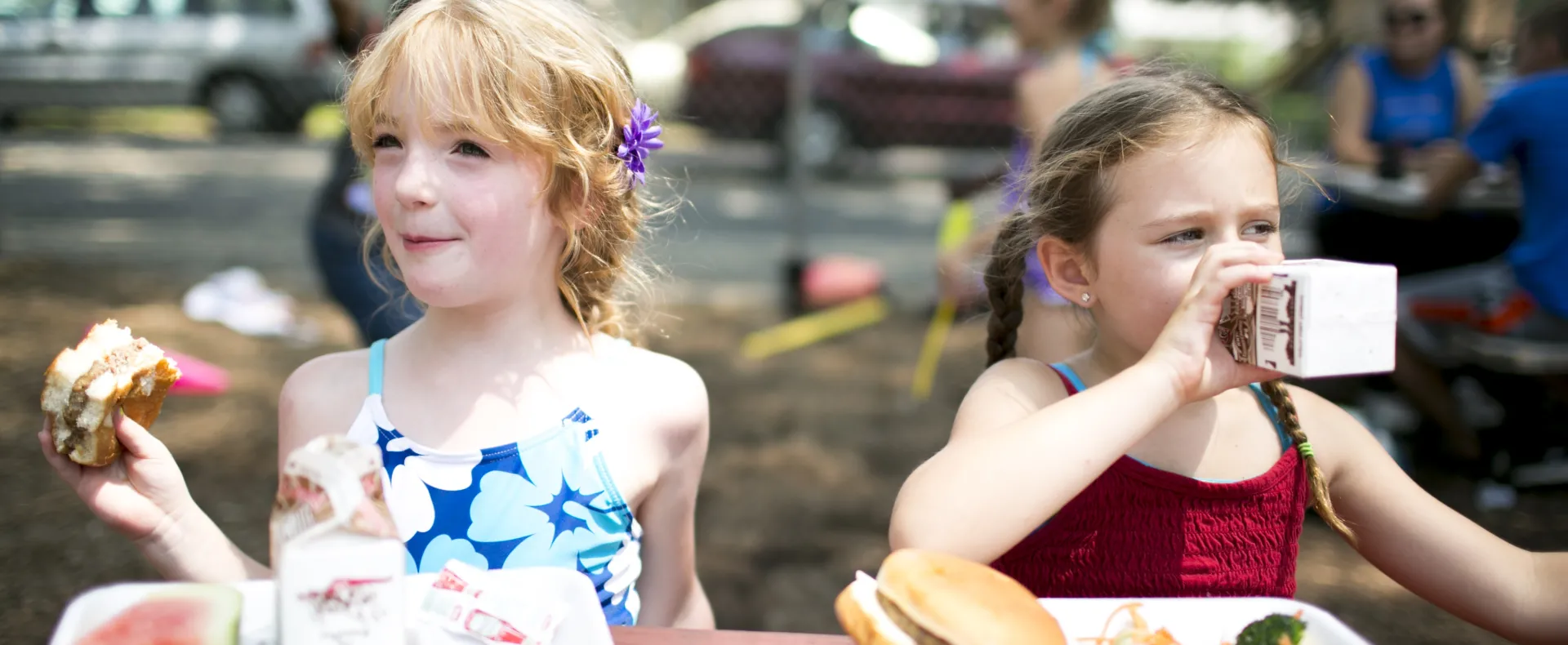 Two girls at a summer meals site