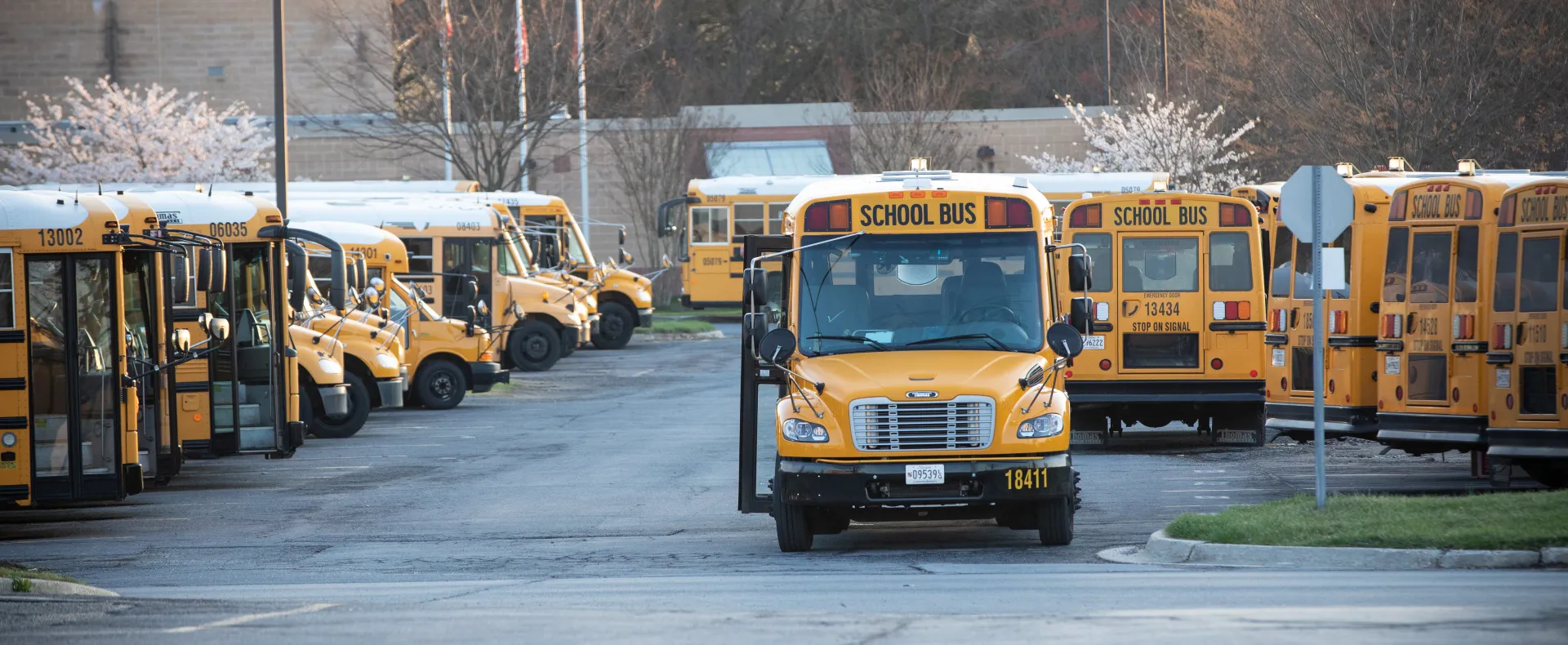 School buses line the parking lot outside Manna Food Center.