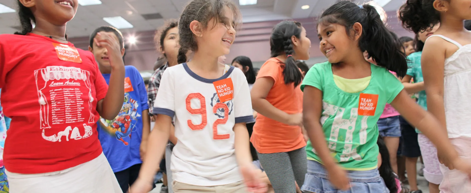 Group of 5 girls dancing