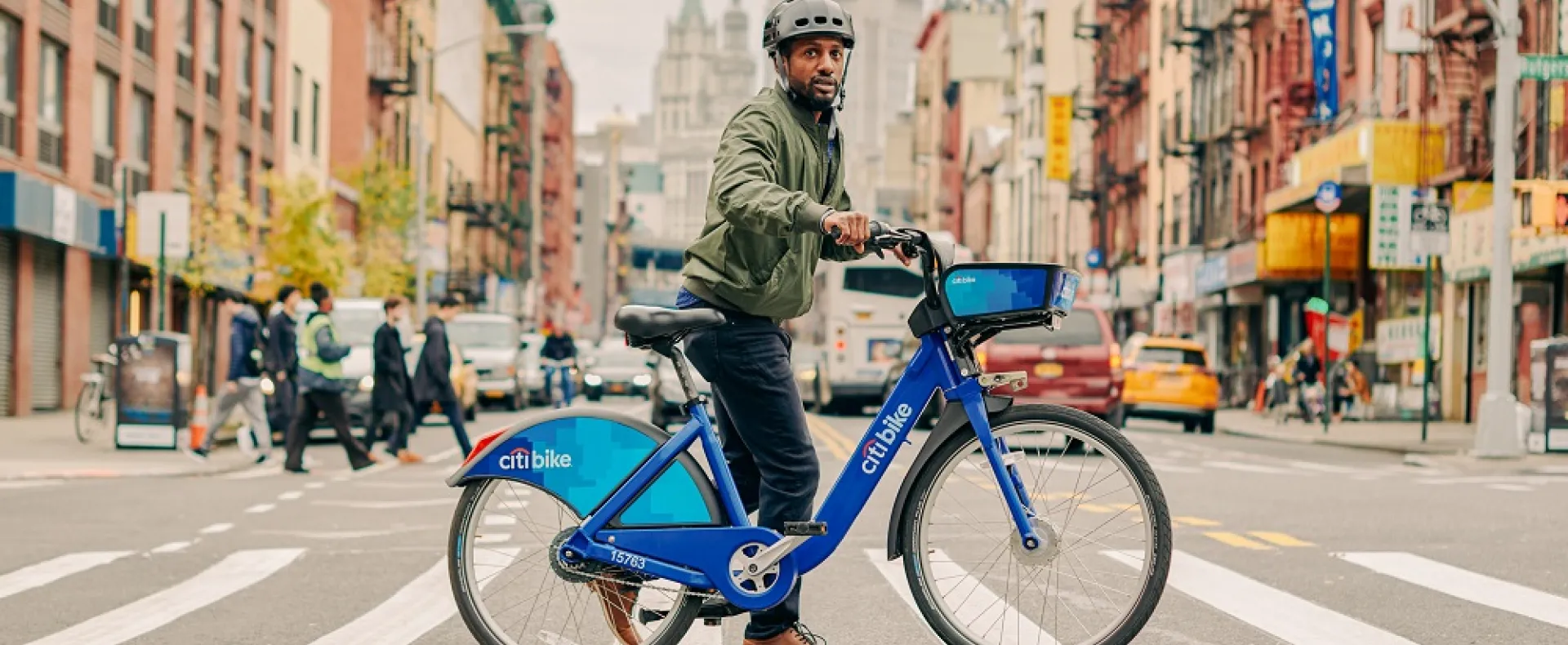 Man on bike in a city