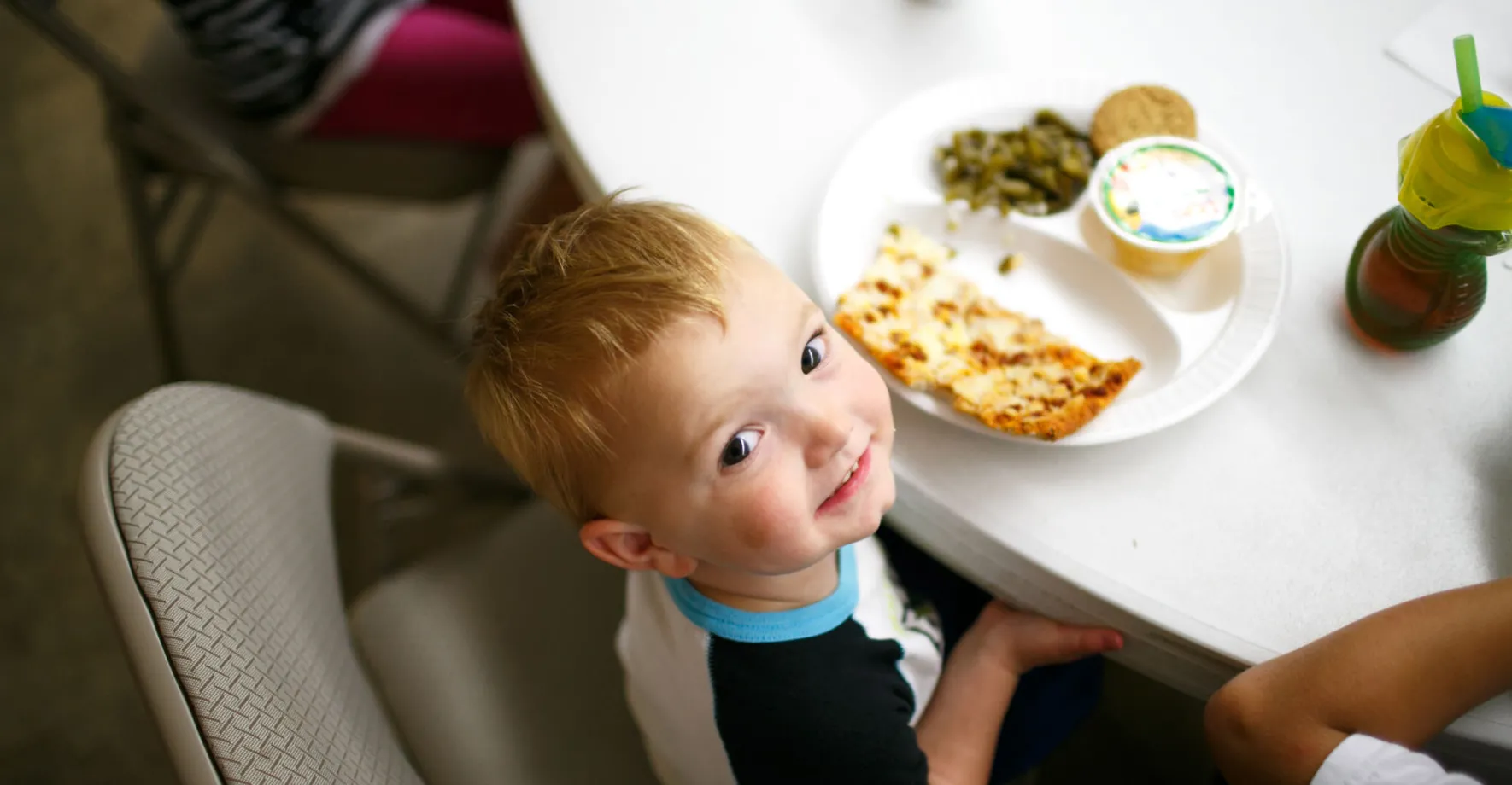 Toddler Eating Lunch