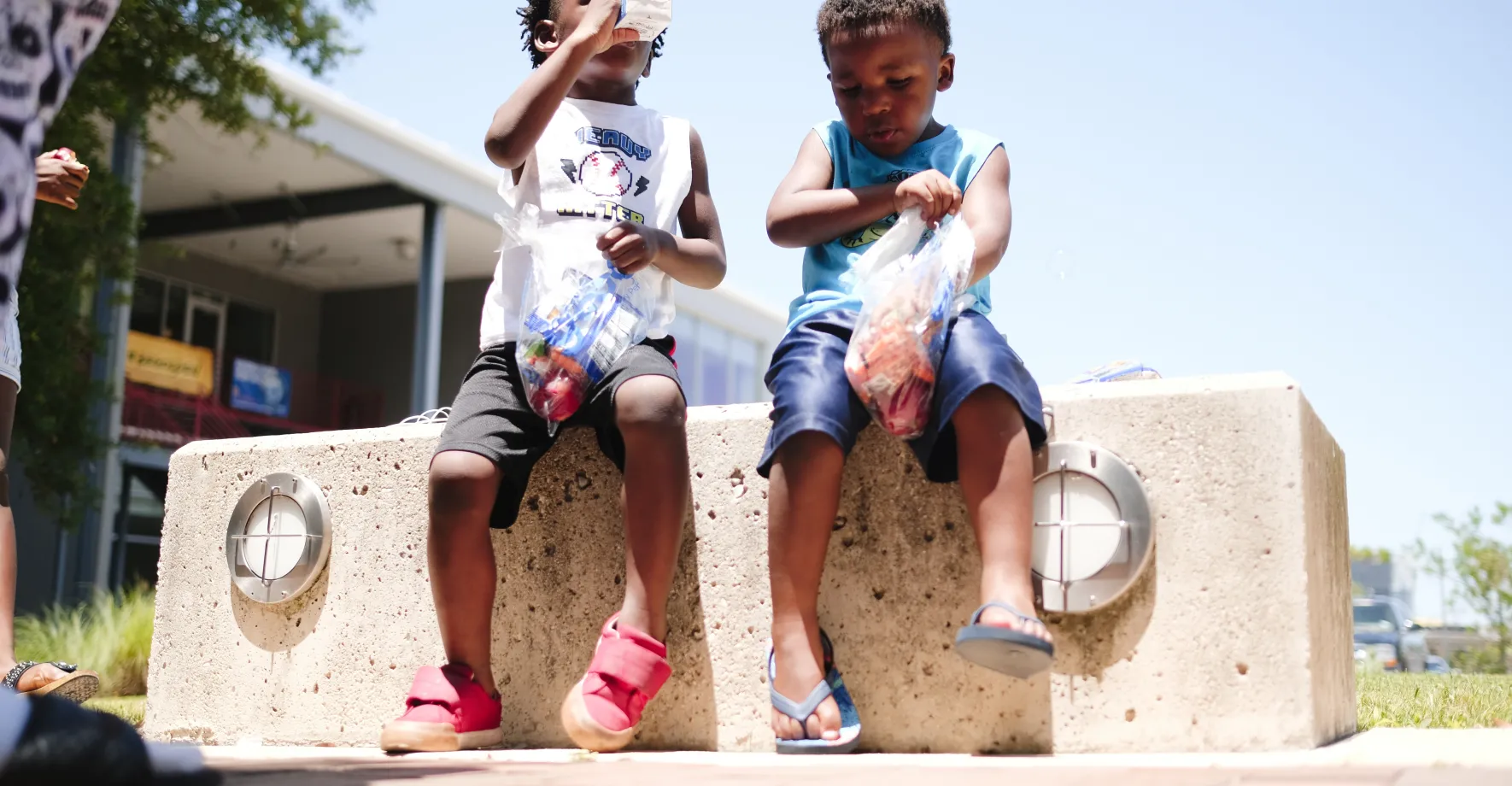 Two young boys on a wall in Texas