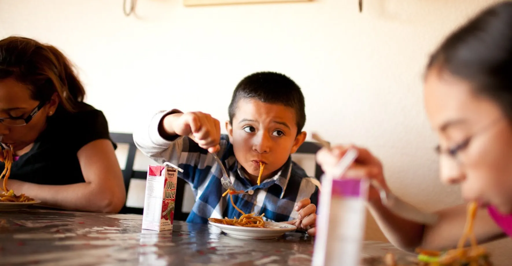 Kids eating dinner