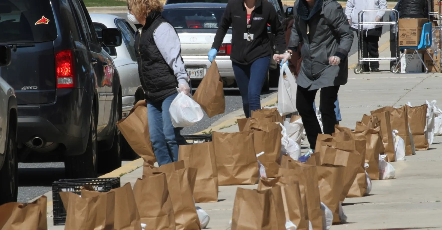 Parents picking up meals near Baltimore