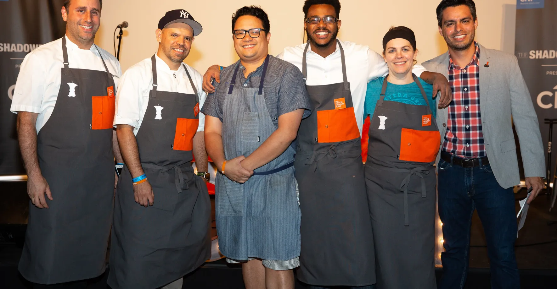 A group of chefs at an event benefitting No Kid Hungry