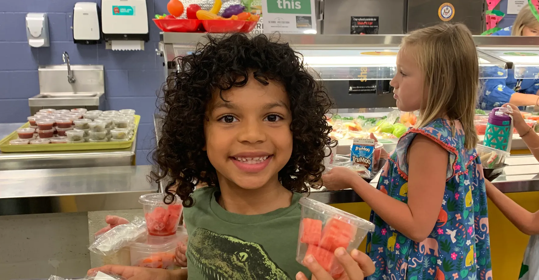 Kid with watermelon cup