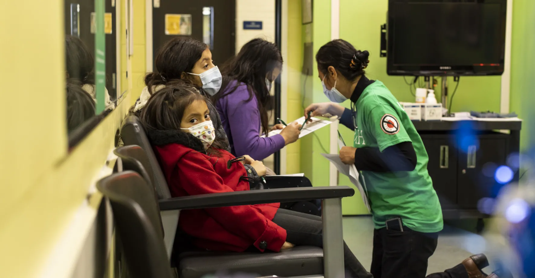 Nurse helping kids