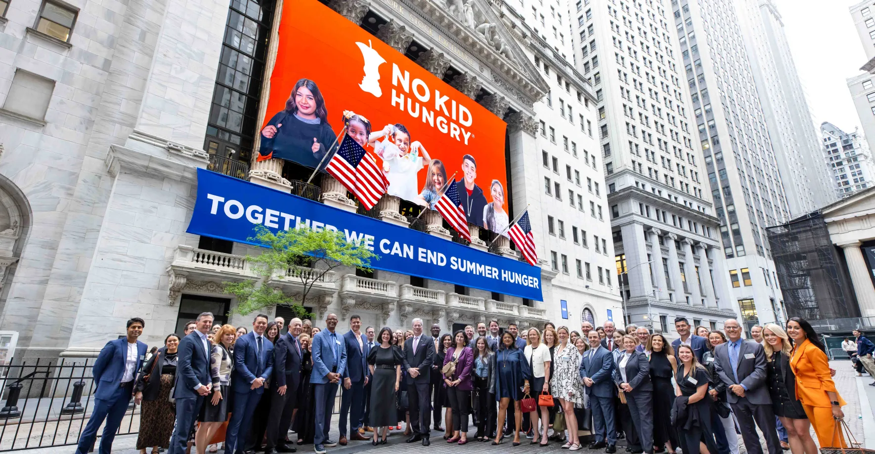 No Kid Hungry team and supporters in front of New York Stock Exchange