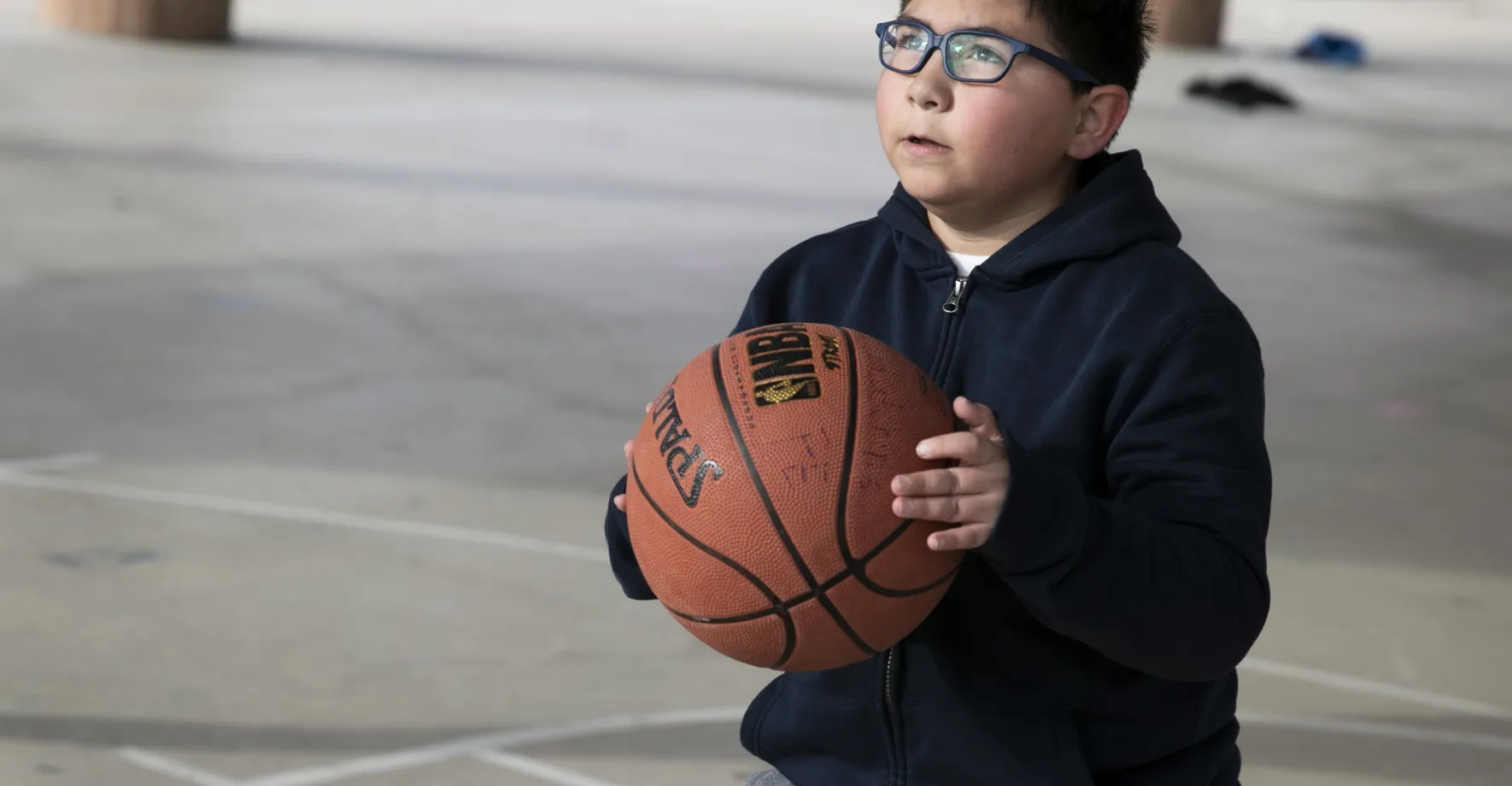 Oliver playing basketball