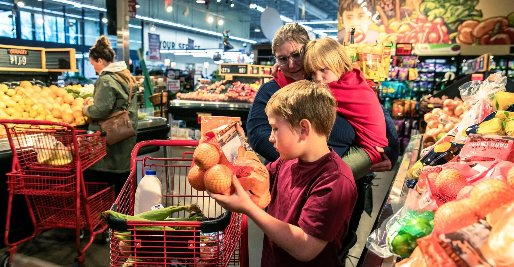 Family shopping at grocery store