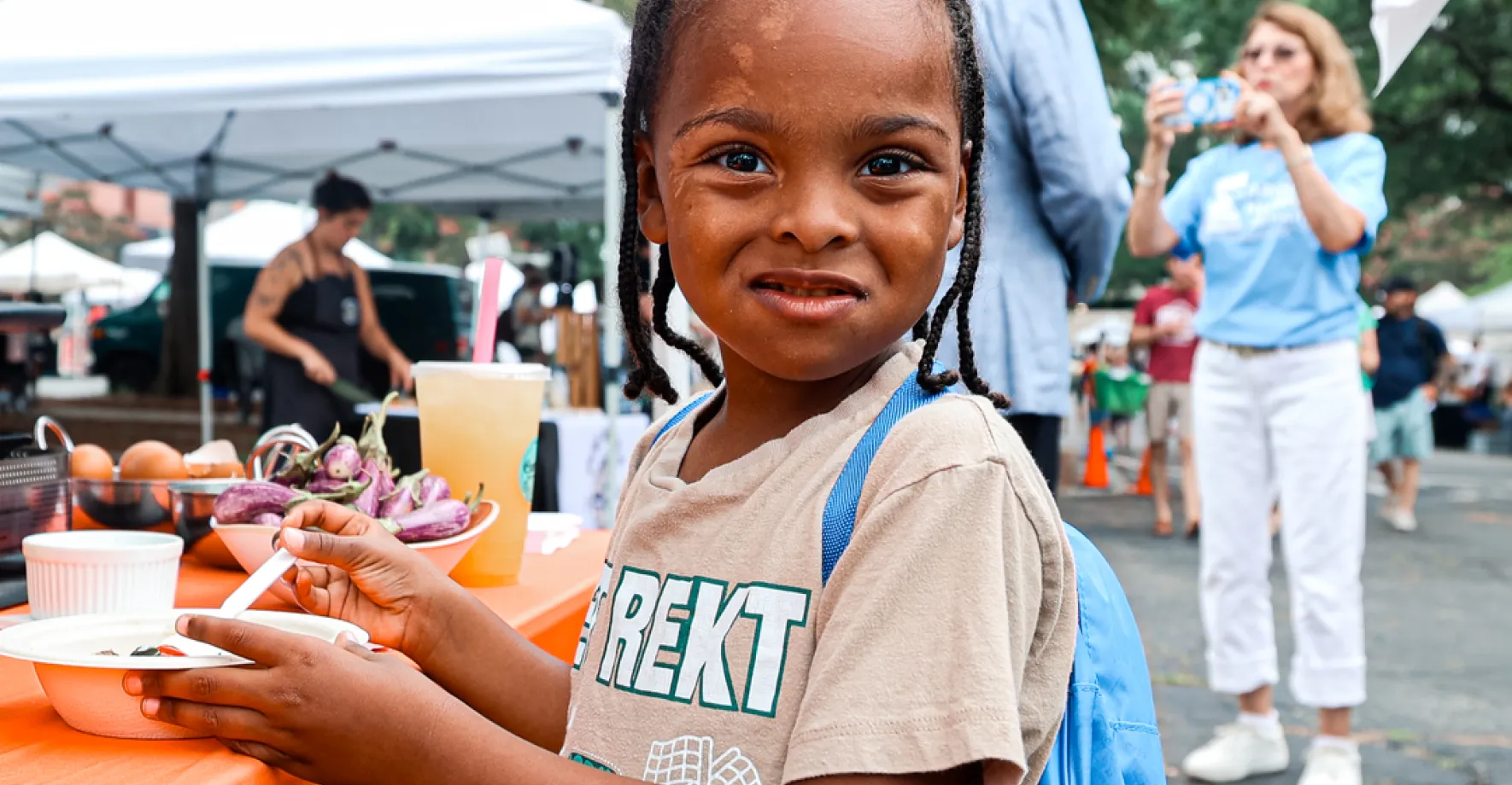 A child at the Uptown Farmers Market in North Carolina