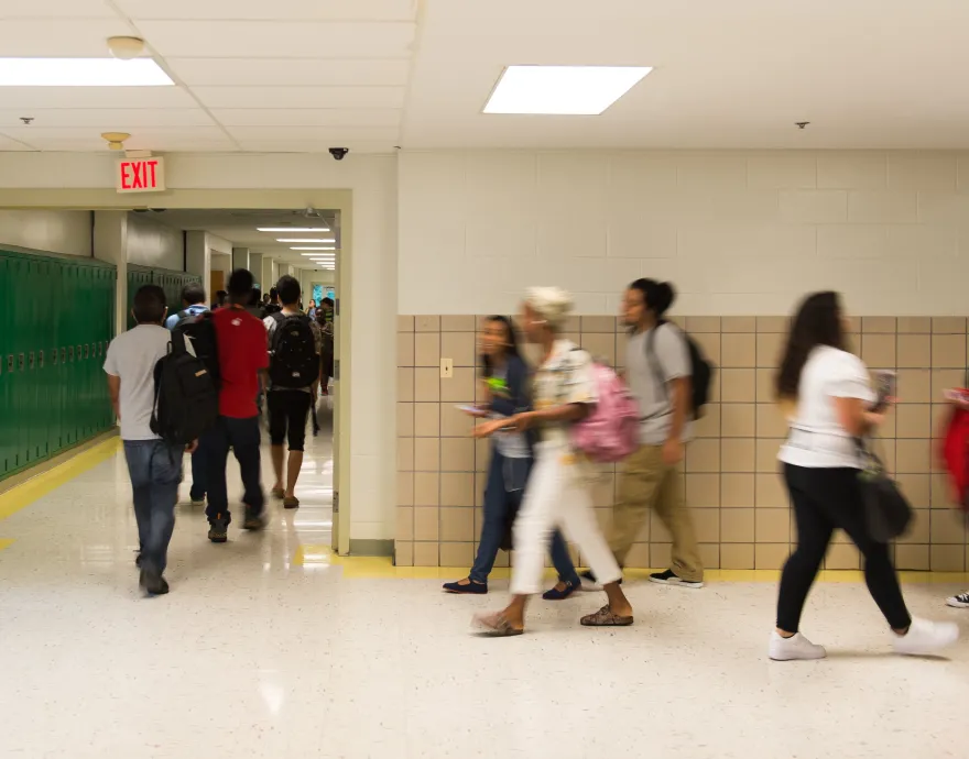 Students walking through a hallway