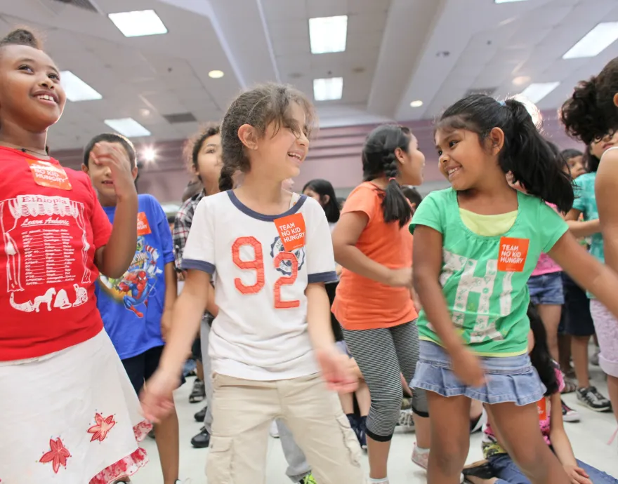 Group of 5 girls dancing