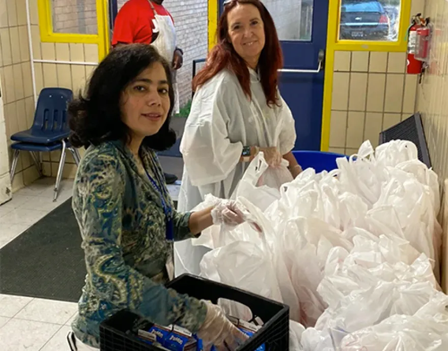 Volunteers at school meal site