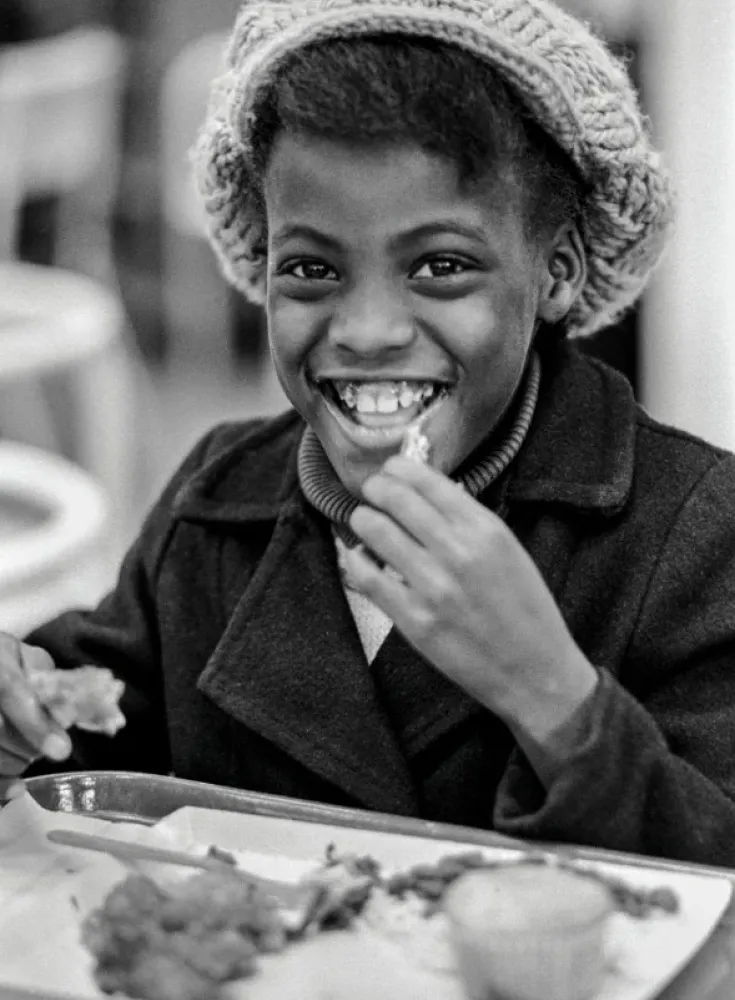 B&W photo of child at Black Panther free breakfast