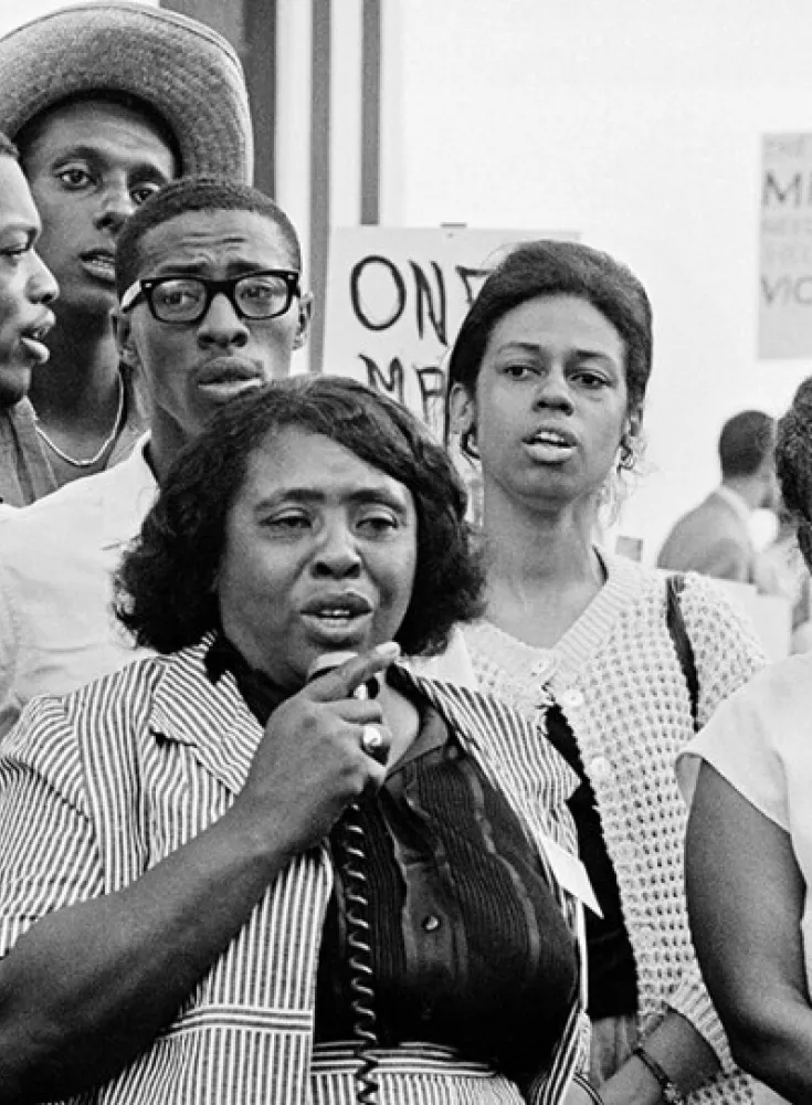 B&W photo of Fannie Lou Hamer speaking at demonstration