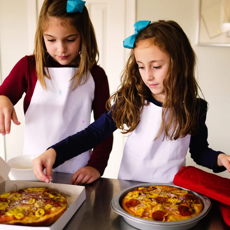 Girls Baking Bread