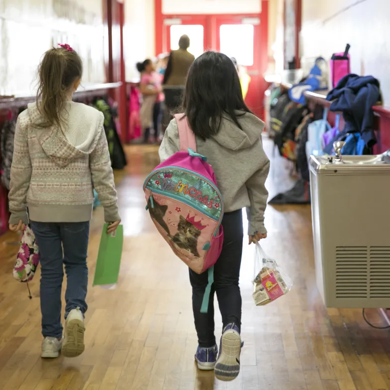 Kids walking in school hallway during COVID crisis