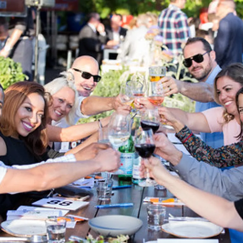 A group of diners at a No Kid Hungry Dinner event
