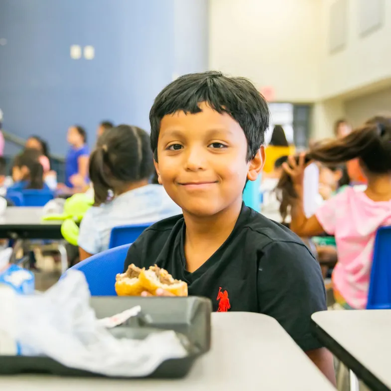 Texas Child Eating Lunch