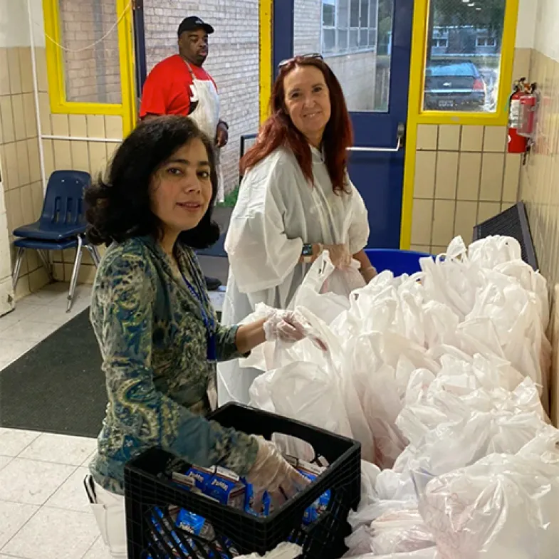 Volunteers at school meal site