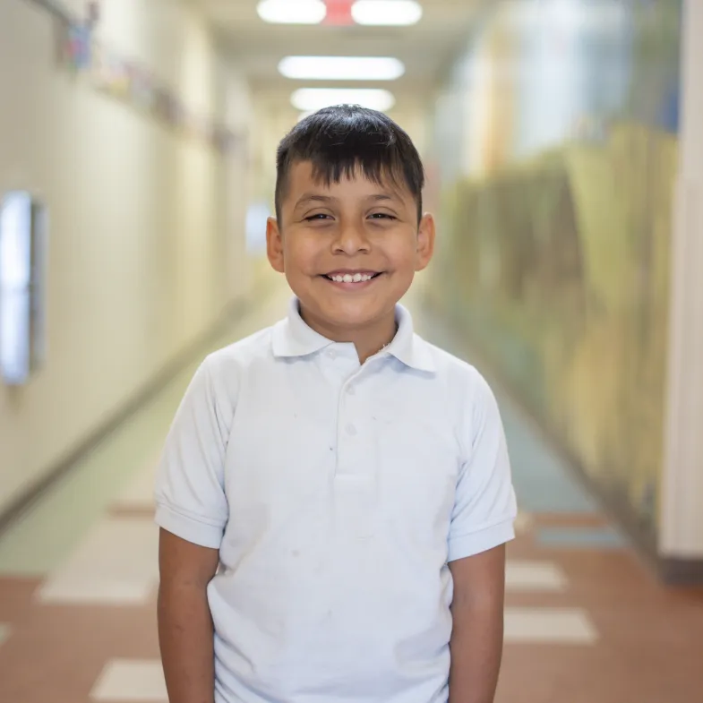 latino kid smiling to camera