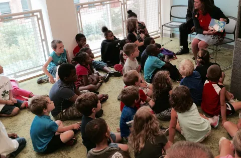 Children listen to a book being read