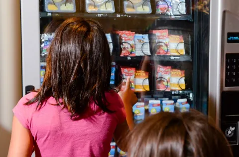 Kids at vending machine