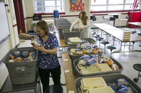 cafeteria staff getting breakfast ready