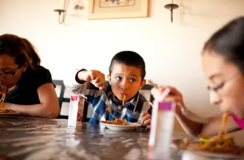 Kids eating dinner