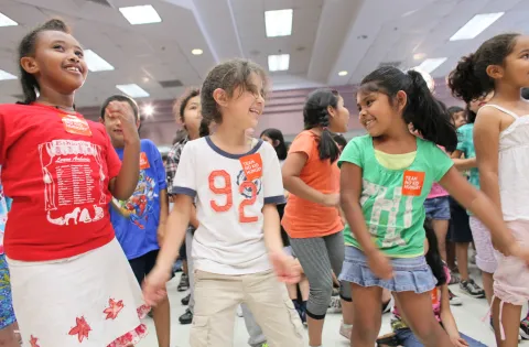 Group of 5 girls dancing