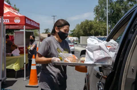 woman delivering meal