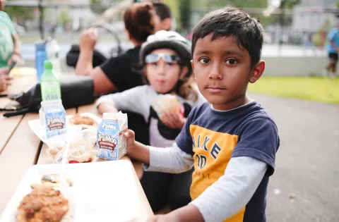 Boy eating summer meal