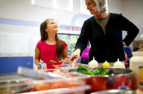 Smiling girl during lunch