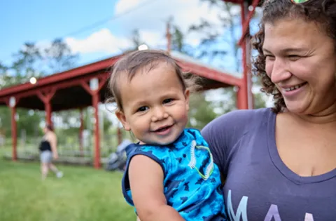 mom holding a baby