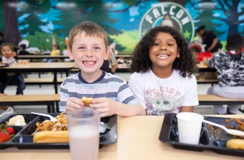 Kids smiling at camera
