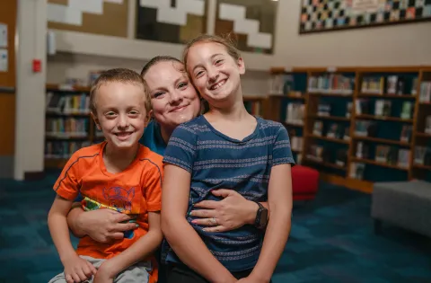 White mom with two kids