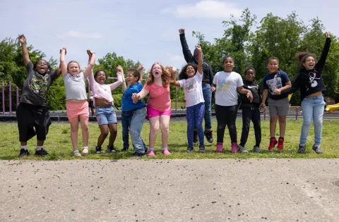 Group of kids celebrating