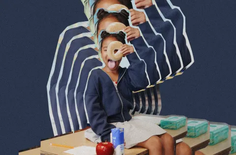 Ripple affect image of a young girl in a blue hoodie and white skirt. She's holding a bagel over one eye as she sits on top of a school desk topped with an apple, juice box, and school papers.