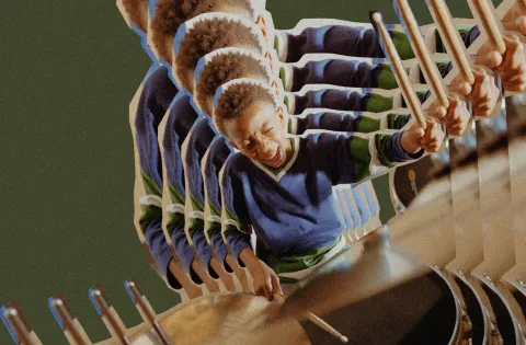a boy playing drums